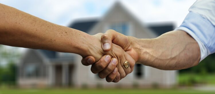 Two People Handshake for a Closed Deal