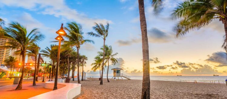 Florida Beach Walk at Sunset with Palm Trees and Buildings