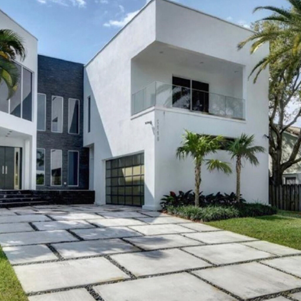 Grey and White Modern Residential Property Funded Deal with Driveway and Garage in South Florida
