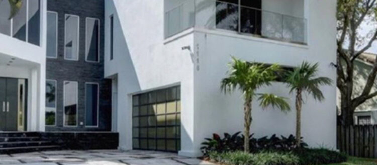 Grey and White Modern Residential Property Funded Deal with Driveway and Garage in South Florida