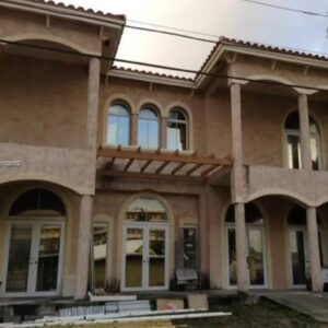 Funded Residential Property with Balconies and Arched Doorways South Florida