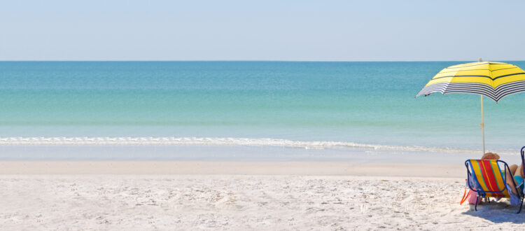 Couple Enjoying Relaxing Day on Uncrowded Florida Beach