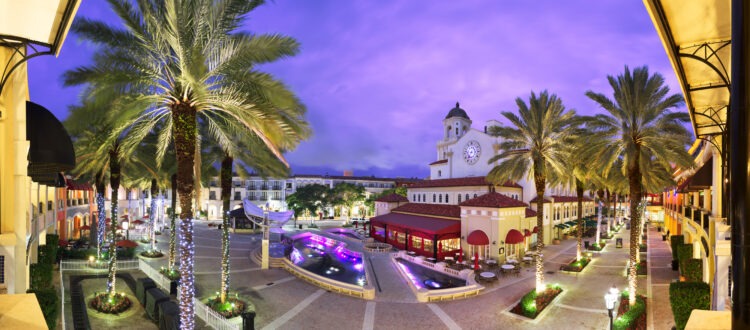 Palm Beach Florida town with beautiful purple sunset cityscape
